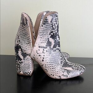 Madden Girl ankle booties with a textured snake print